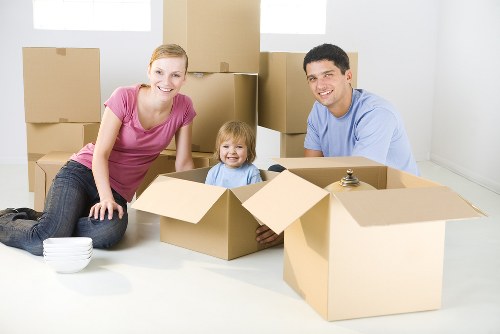 Man With Van Brent team carrying furniture safely during a move