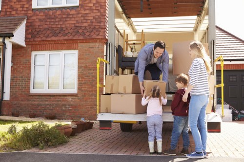 Professional team relocating business furniture in Brent