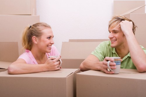 Loading household furniture into a moving van in Brent
