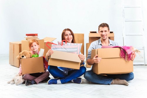 Moving boxes and household items prepared for transport in Brent