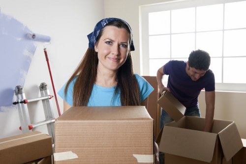 Packed business items labelled for relocation in Brent