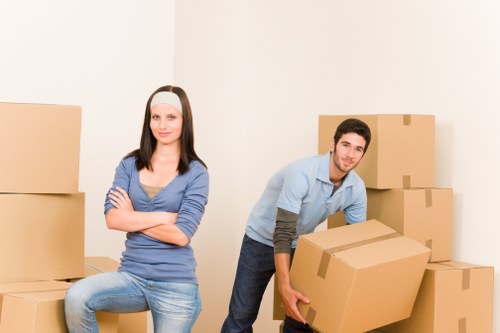 Local packing team organizing belongings for a flat move in Brent
