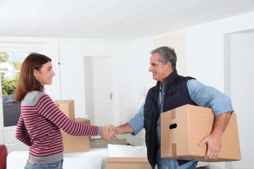 Moving vehicle loading commercial furniture in Brent