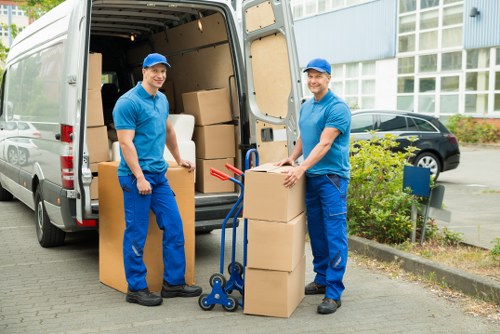 Packed office boxes and furniture ready for relocation