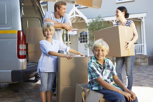 Packed household boxes prepared for removals in Brent