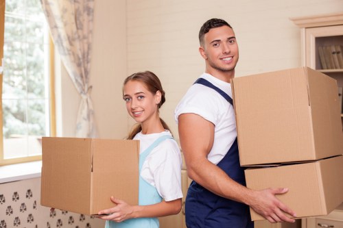 Careful loading of boxes and furniture into a moving van