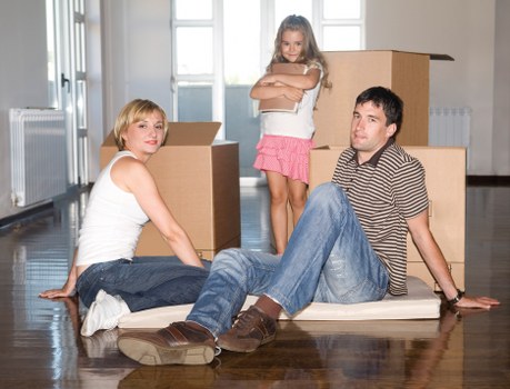 Household and office items loaded into a removal van in Brent